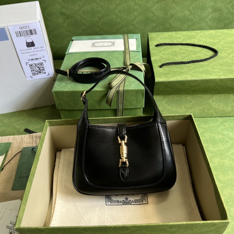G*u*i top handle bags